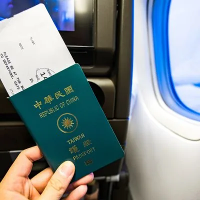 Passport and boarding pass on a flight