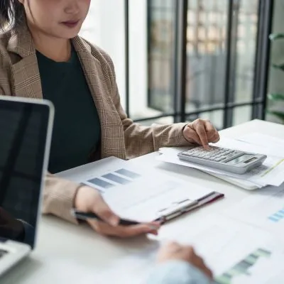 Paperwork being checked at a desk